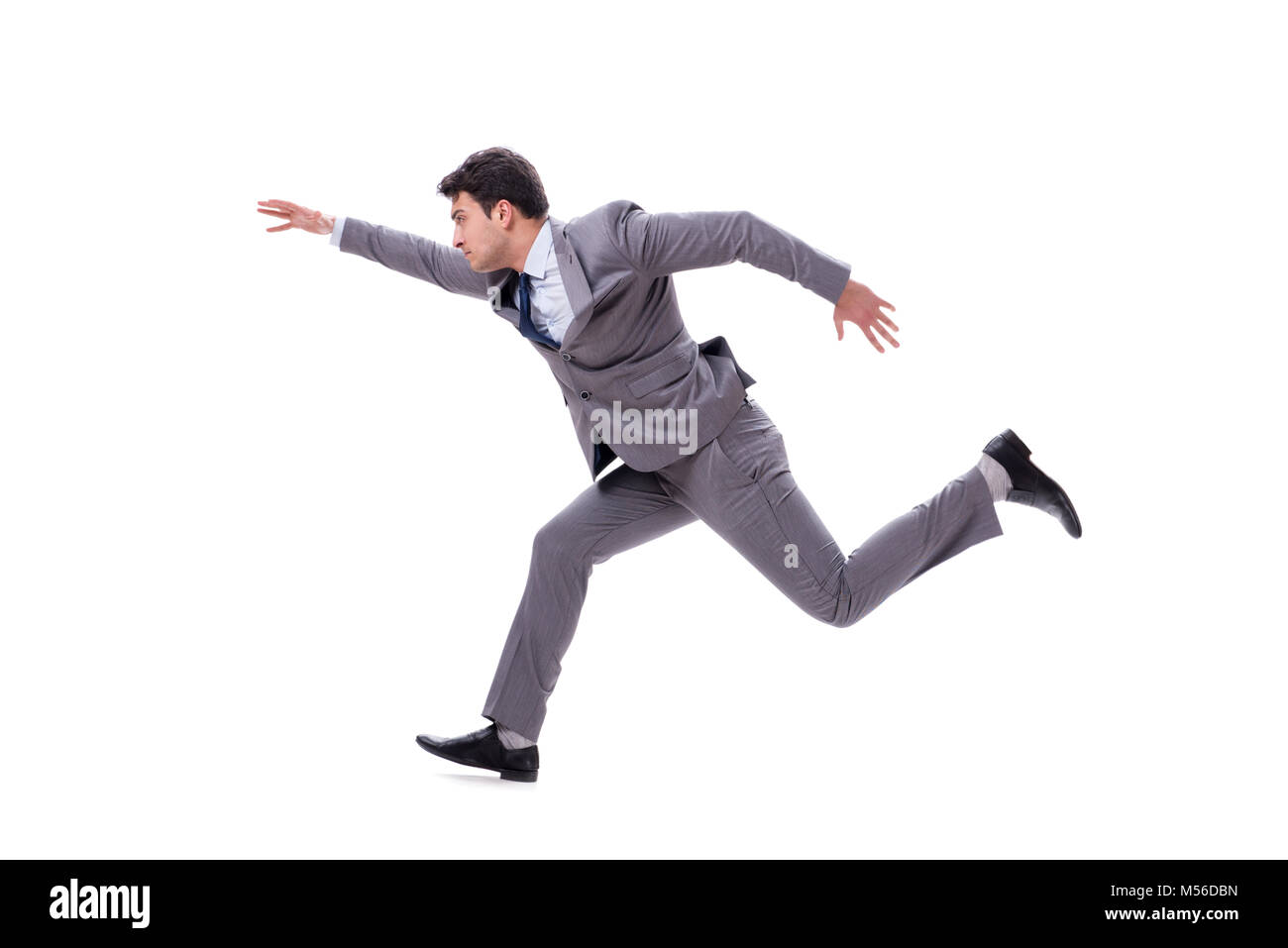 Young businessman running forward isolated on white Stock Photo - Alamy