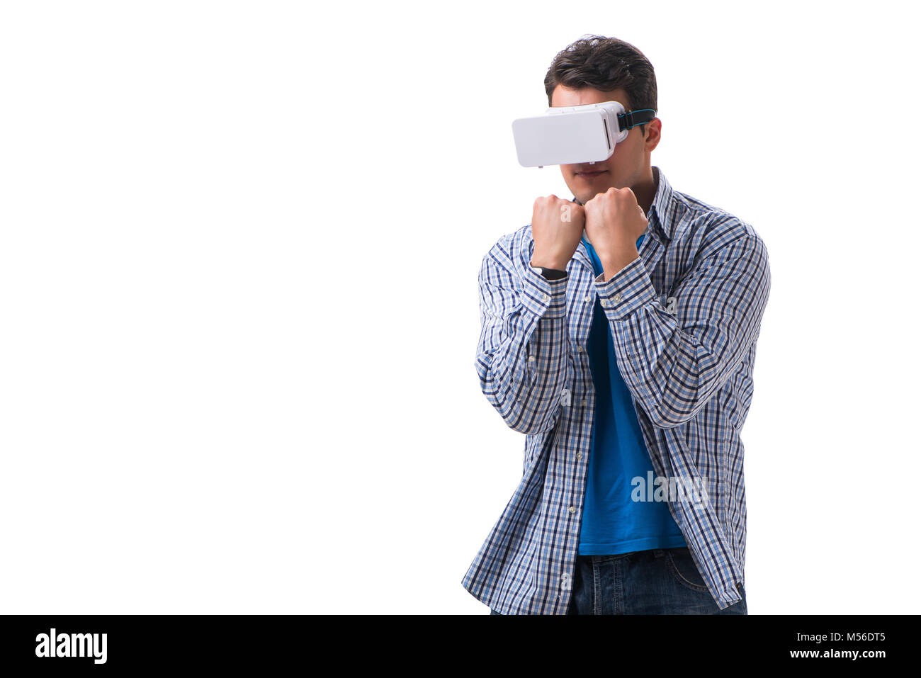 Young man wearing virtual reality VR glasses Stock Photo - Alamy