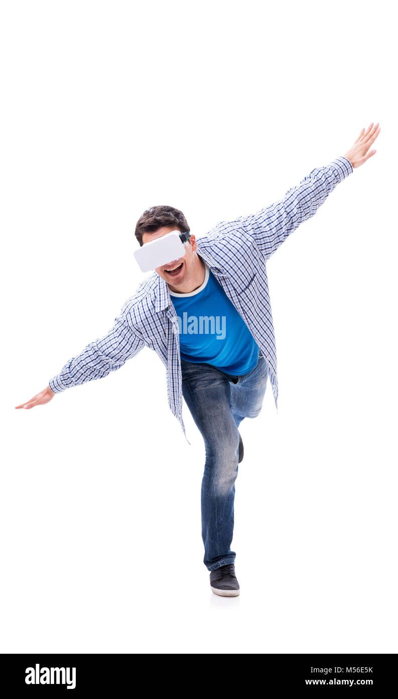 Young man wearing virtual reality VR glasses Stock Photo - Alamy