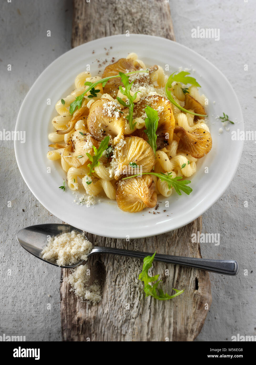 Food inage yellow oyster mushrooms with spaghetti hires stock