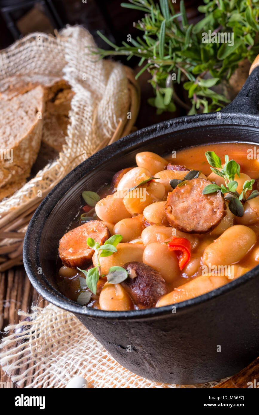 Polish Baked Beans with sausage Stock Photo Alamy