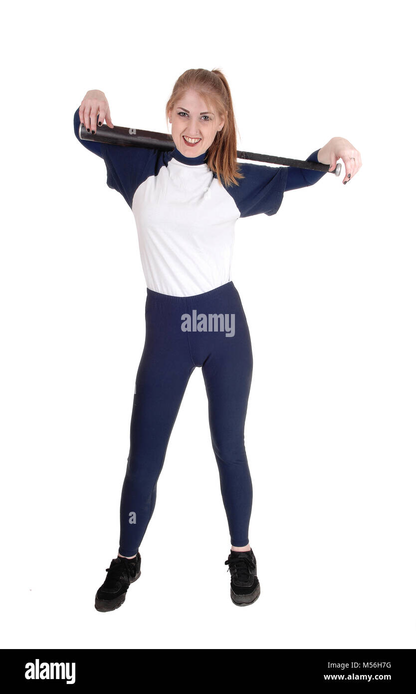 Woman holding her softball bat over her shoulder Stock Photo