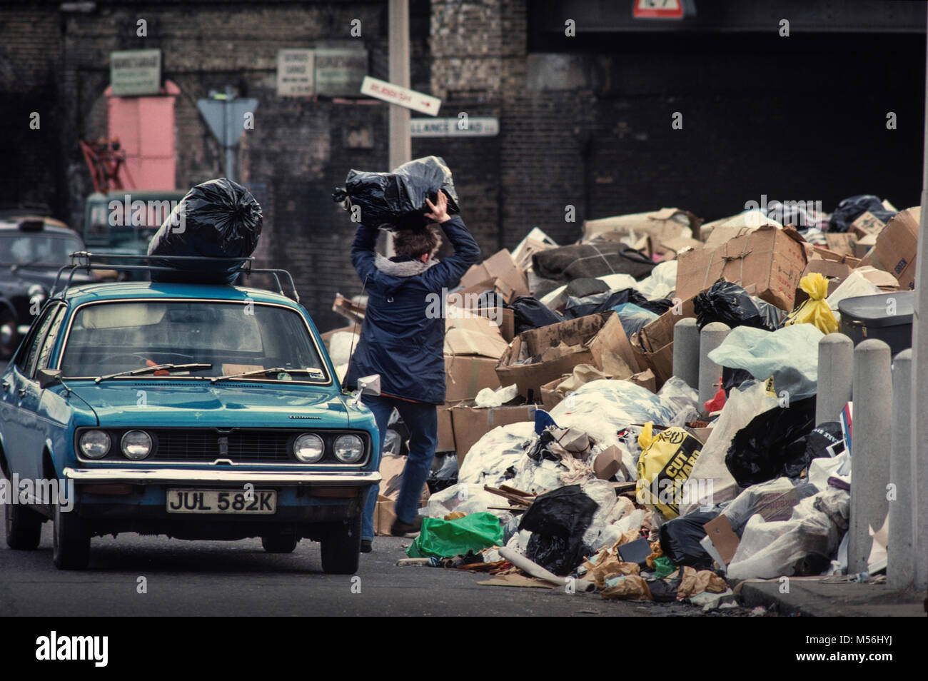 Winter of Discontent. Rubbish piled up in streets  east end of London as refuse collectors were on strike along with Public sector employees. 1979 Stock Photo
