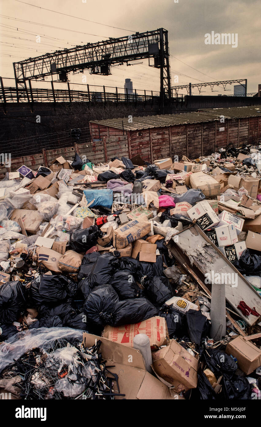 Winter of Discontent. Rubbish piled up streets  east end of London as refuse collectors were on strike along with Public sector employees. 1979 Stock Photo