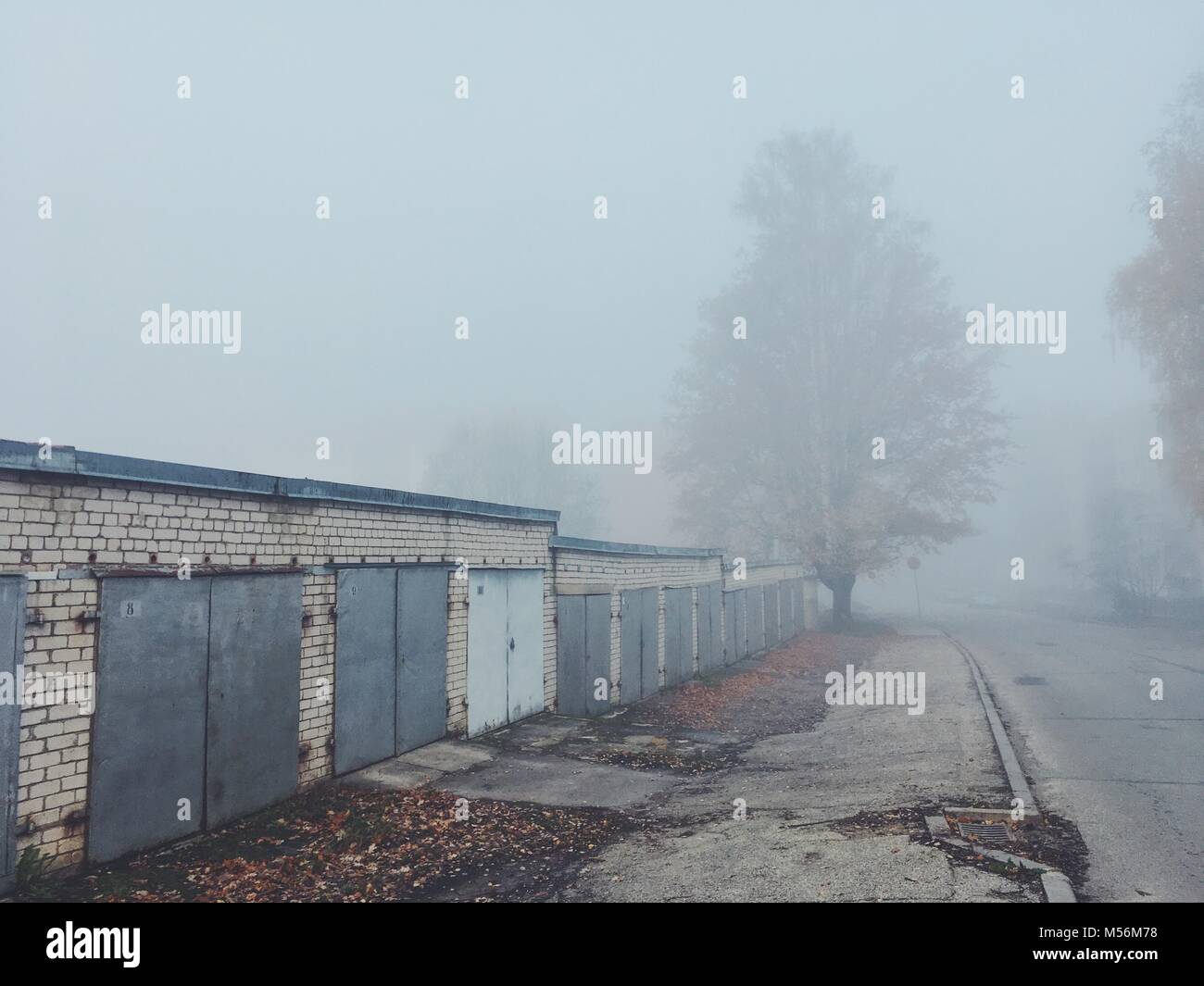 Garages in a foggy morning. City landscape. Stock Photo