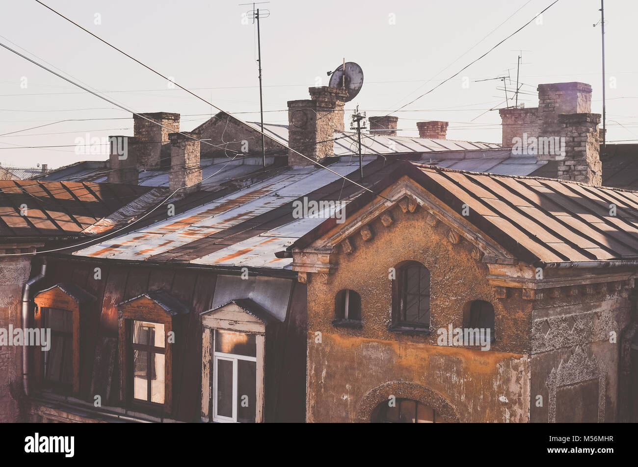 Roof tops in a sunny day. Old houses. Latvia capital city - Riga. Stock Photo