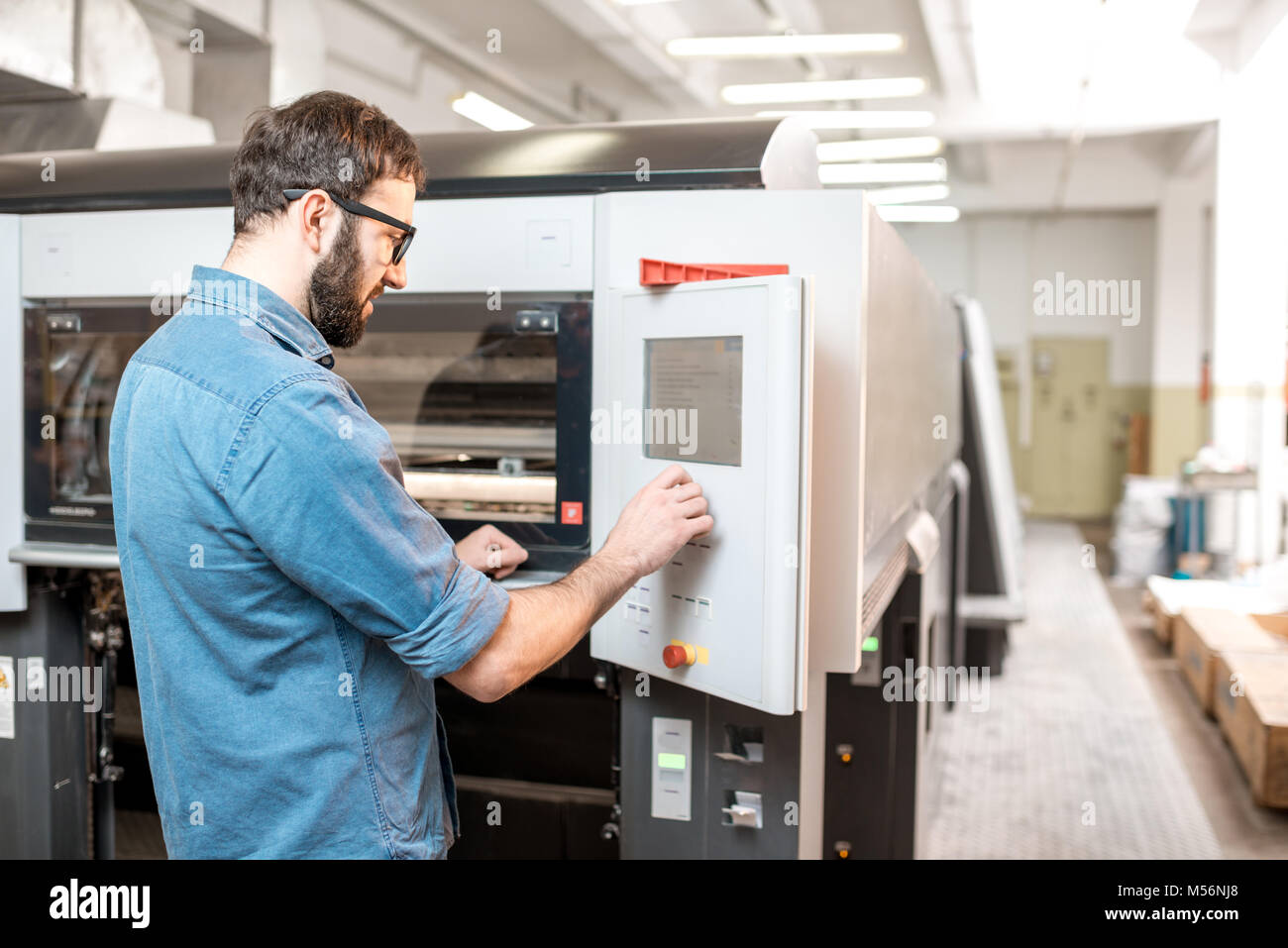 Printing operator working at the manufacturing Stock Photo Alamy
