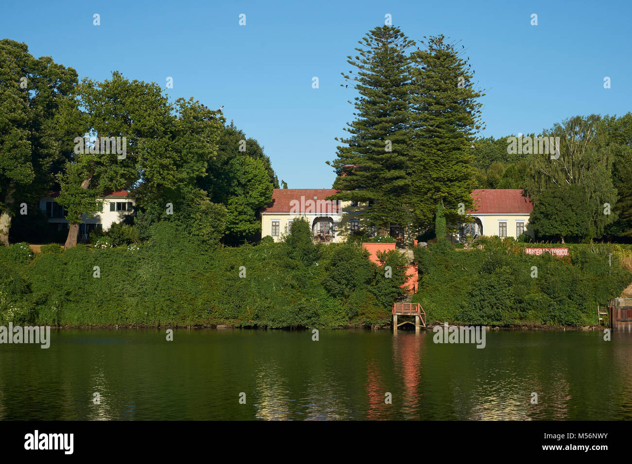 Historic building with landscaped garden on the waterfront of Valdivia in southern Chile. Stock Photo