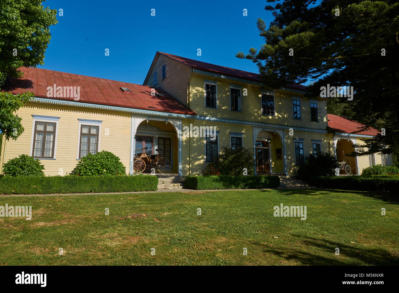 Historic building with landscaped garden on the waterfront of Valdivia in southern Chile. Stock Photo