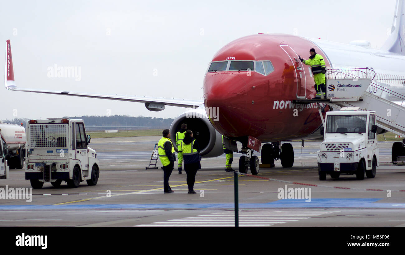 BERLIN, GERMANY - JAN 17th, 2015: Norwegian Boeing 737 airplane arriving at the gate in Berlin Schonefeld airport SXF Stock Photo