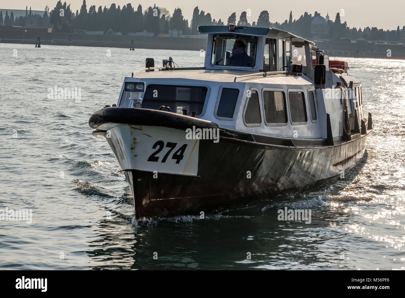Venetian public transport boat. Venice, Italy. February 11, 2018. Stock Photo