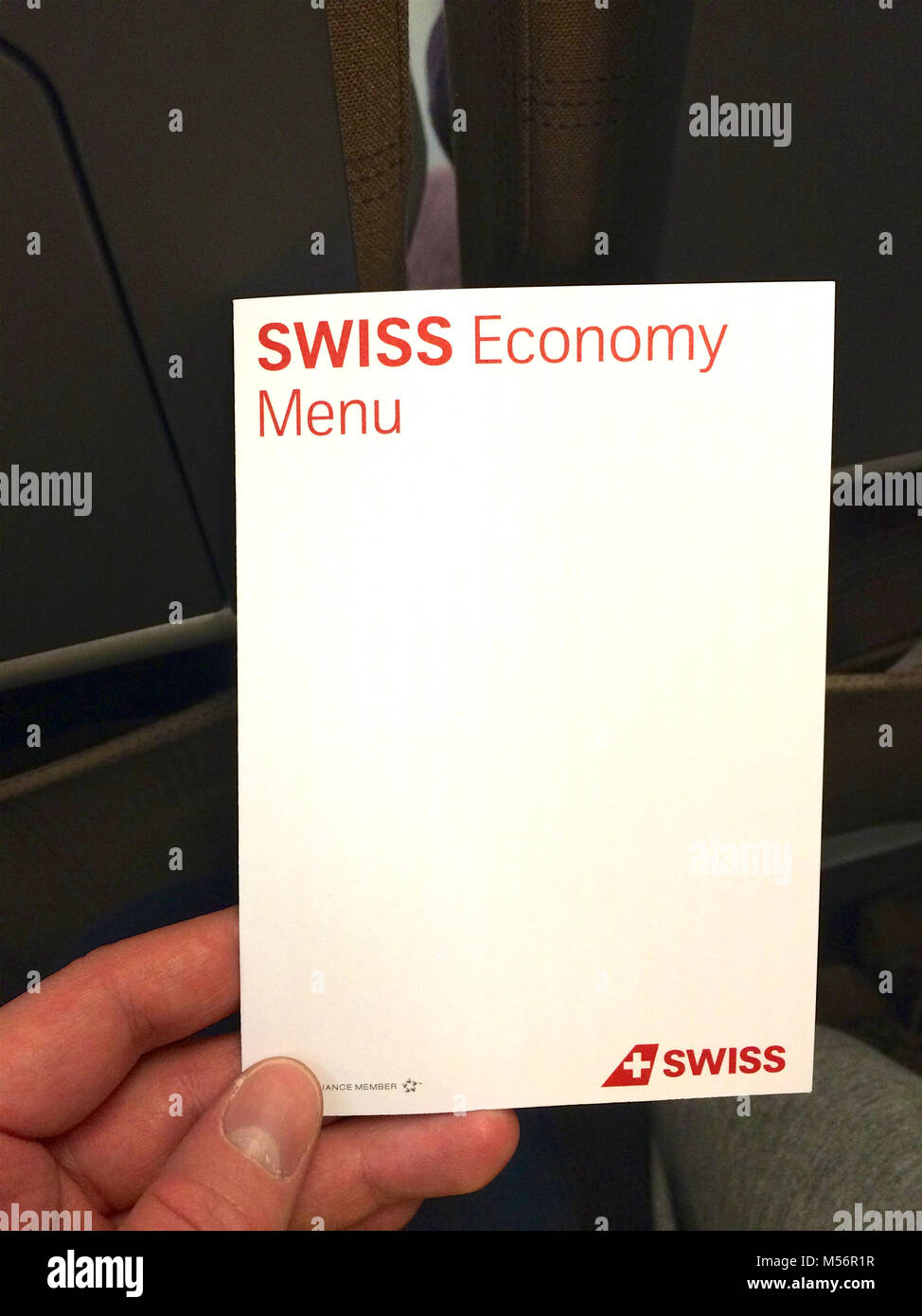 ZURICH, SWITZERLAND - MAR 31st, 2015: SWISS food menu on the plane of economy class flight Stock Photo