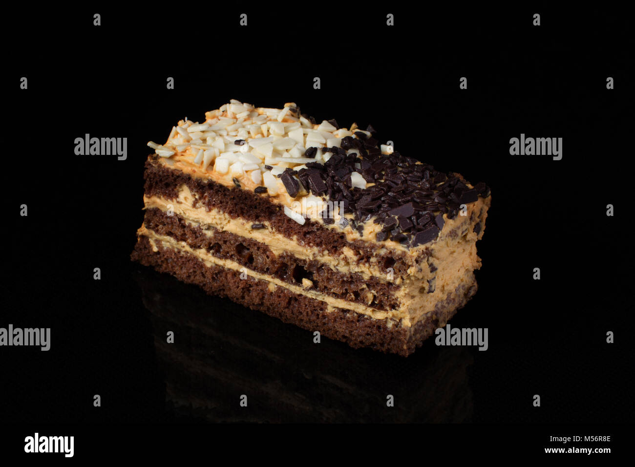 Piece Of Cake With White And Black Chocolate On A Black Background Russian Cake Day And Night Stock Photo Alamy