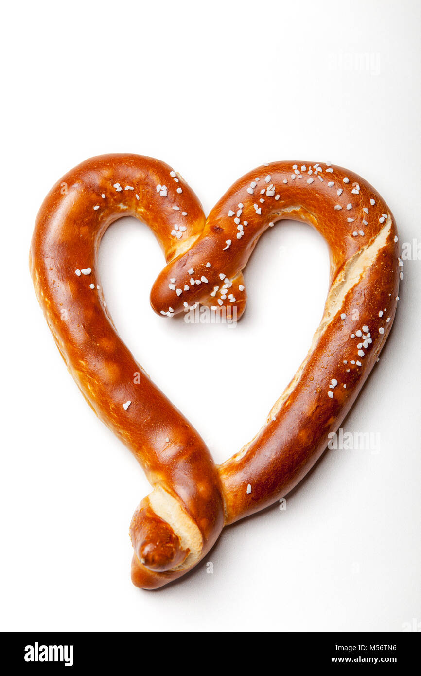 heart shaped pretzel on white Stock Photo Alamy