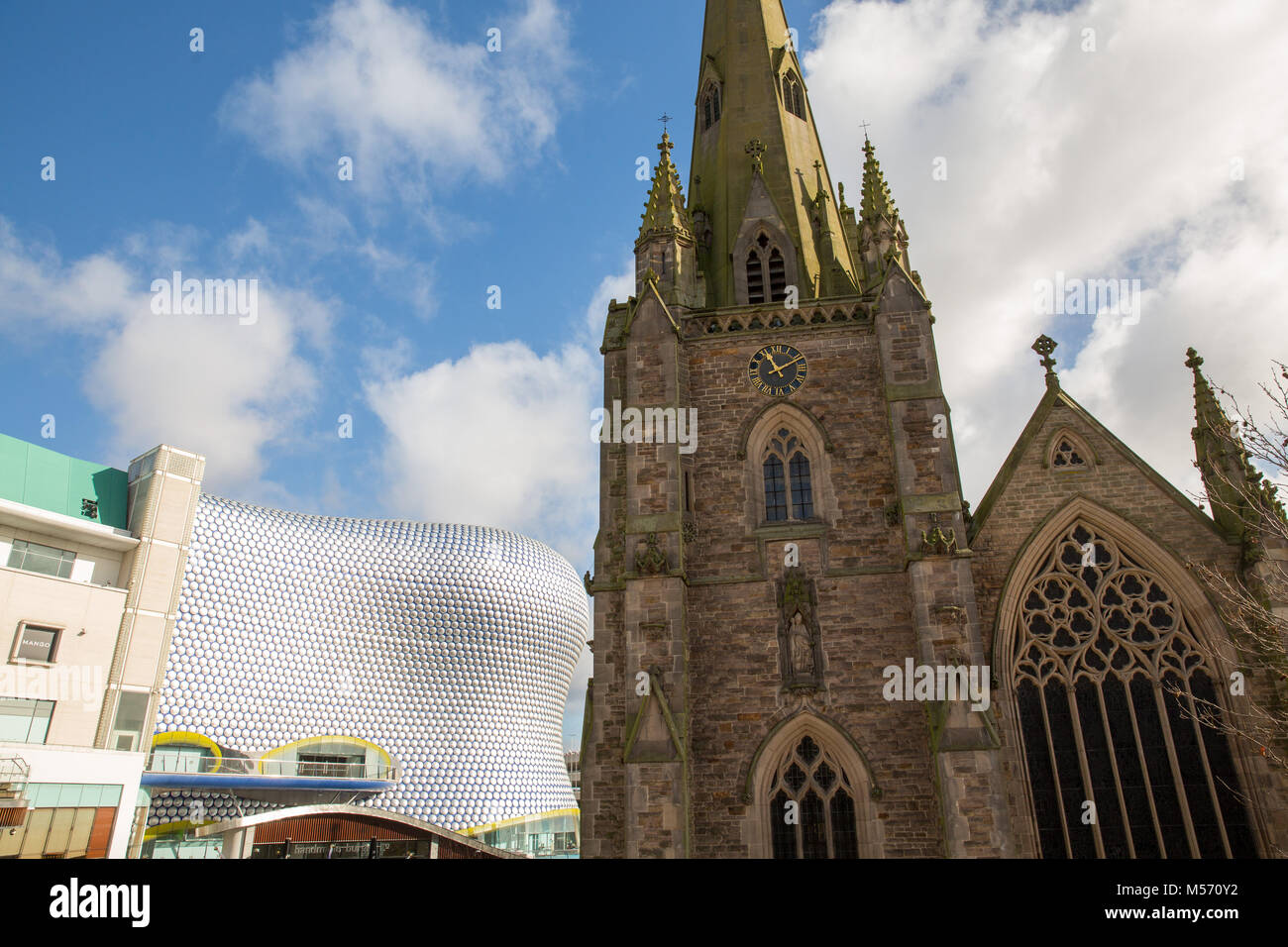 The Selfridges building framed by Saint Martin in the bullring, Birmingham, England, UK. Stock Photo
