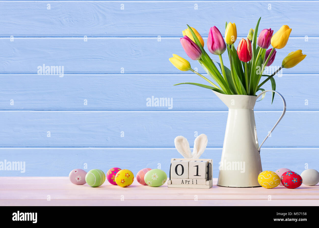 Easter - Calendar Date With Decorated Eggs And Tulips - Pastel Colors Stock Photo