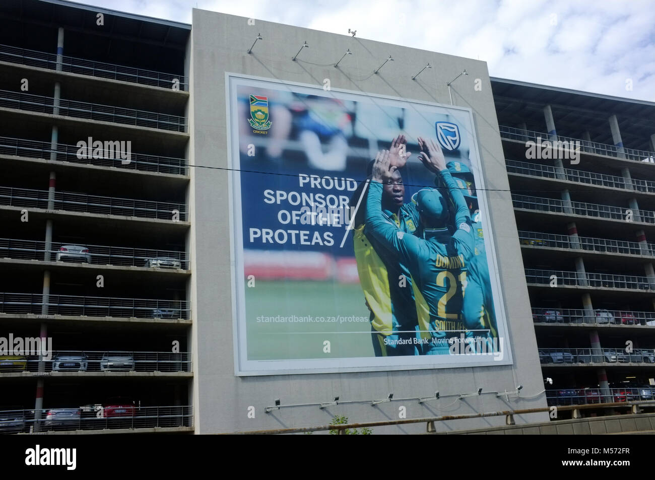 South African cricket advert on the side of a car park Stock Photo