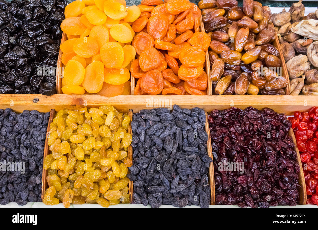 dry fruit mix on a pile on a food market, coloful dry fruits, dried fruits, different types of