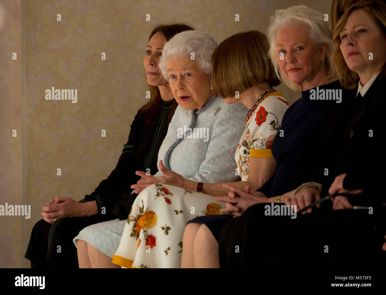 (Left to right) British Fashion Council chief executive Caroline Rush, Queen Elizabeth II, Anna Wintour and Angela Kelly sit in the front row at the Richard Quinn Autumn/Winter 2018 London Fashion Week show at BFC Showspace, London. PRESS ASSOCIATION. Picture date: Tuesday February 20, 2018. Photo credit should read: Isabel Infantes/PA Wire Stock Photo