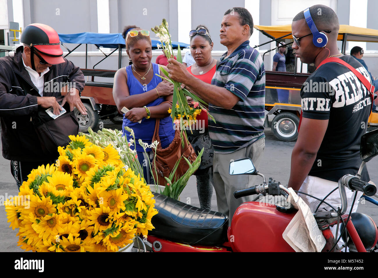 Flowers market - mobile flowers shop on a bike, Cienfuegos, Cuba, Caribbean Stock Photo