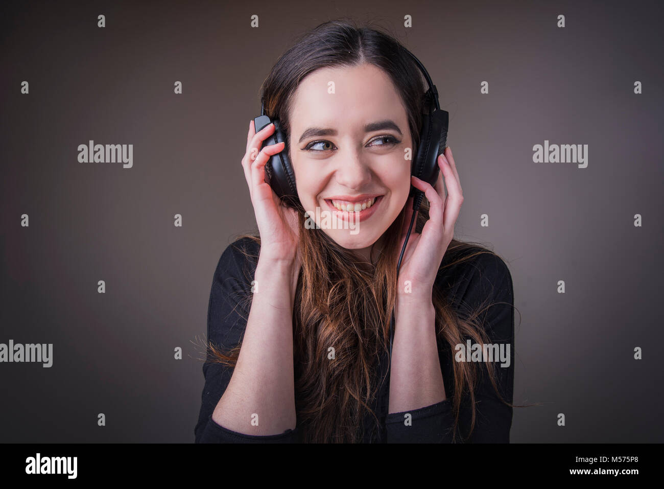 Enjoying favorite music attractive hi-res stock photography and images ...