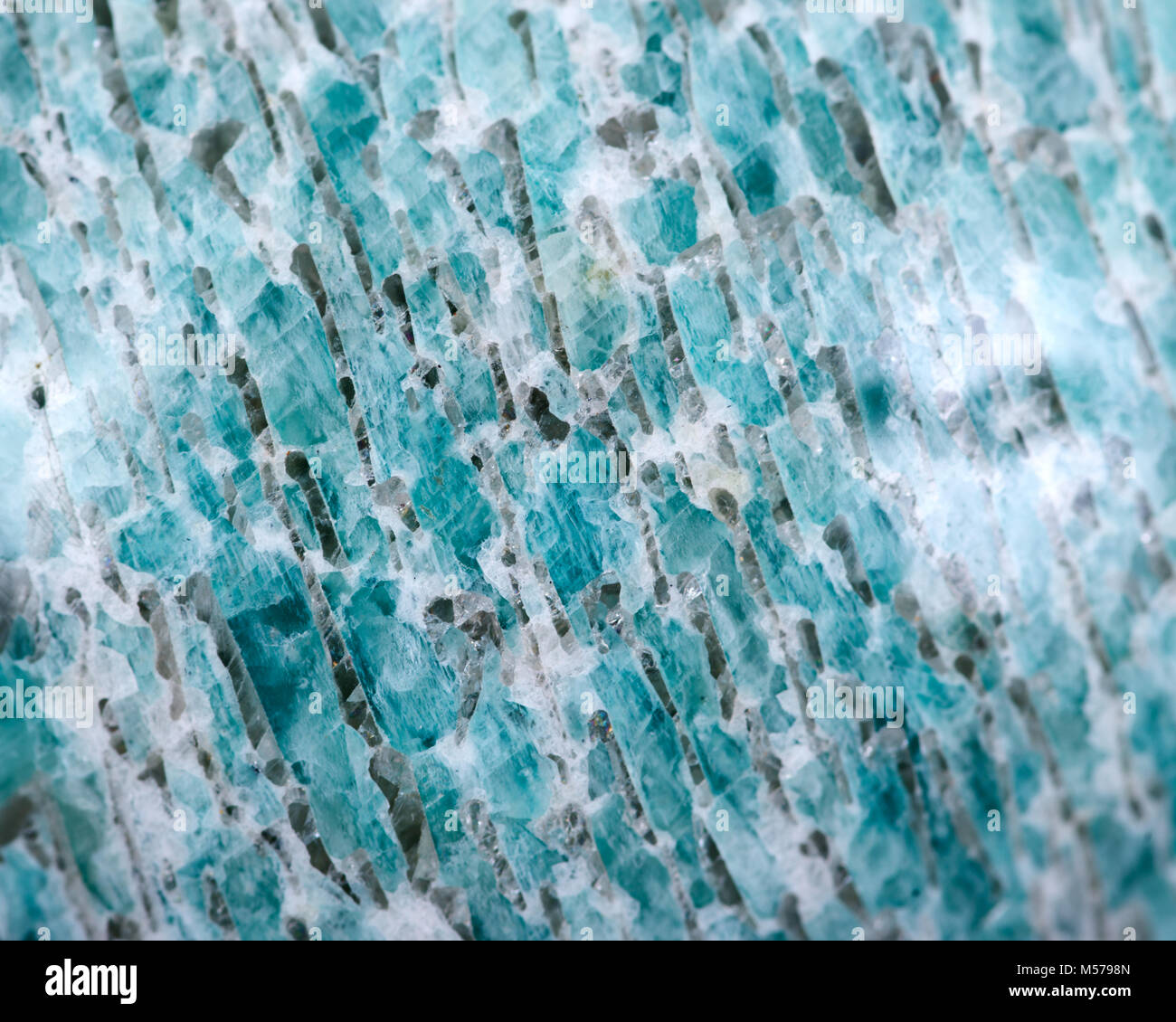 Green amazonite with smoky quartz from Madagascar as texture