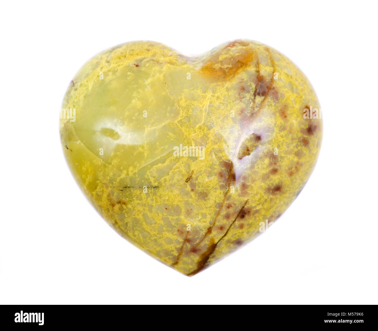 Polished Madagascar green opal carved heart, isolated on white background Stock Photo