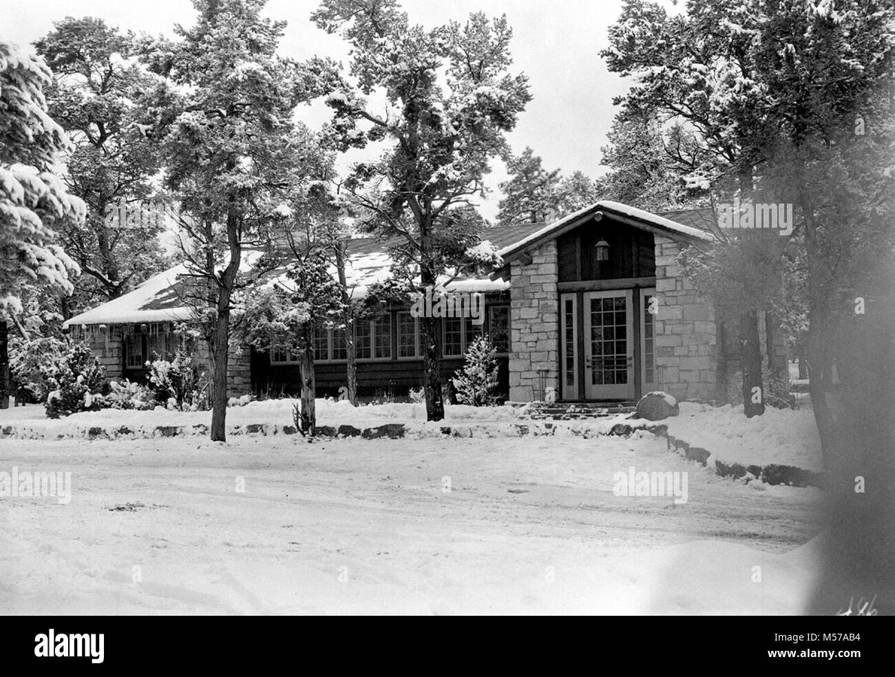 Grand Canyon Old Cameron Hotel and Post Office . FRONT ENTRANCE TO DEL WEB POST OFFICE BUILDING IN SNOW, NOW THE MAGISTRATE'S OFFICE.  FEB. 17, 1936.  . Stock Photo
