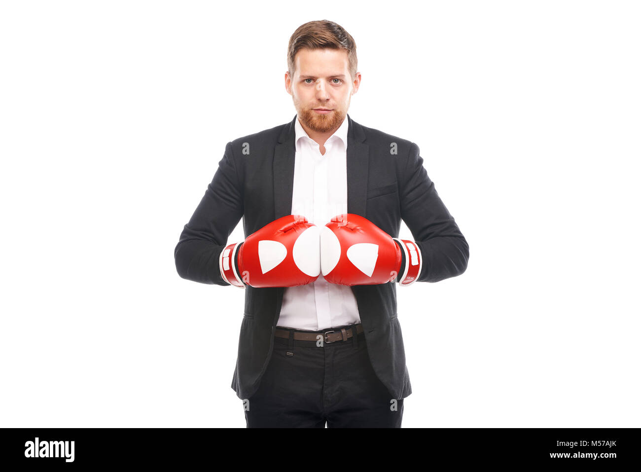 Businessman in boxing gloves Stock Photo