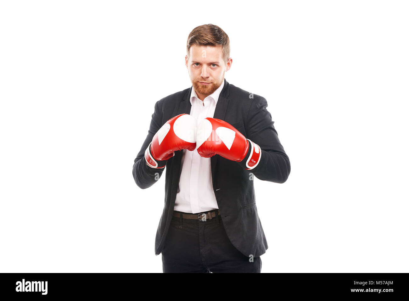 Businessman in boxing gloves Stock Photo