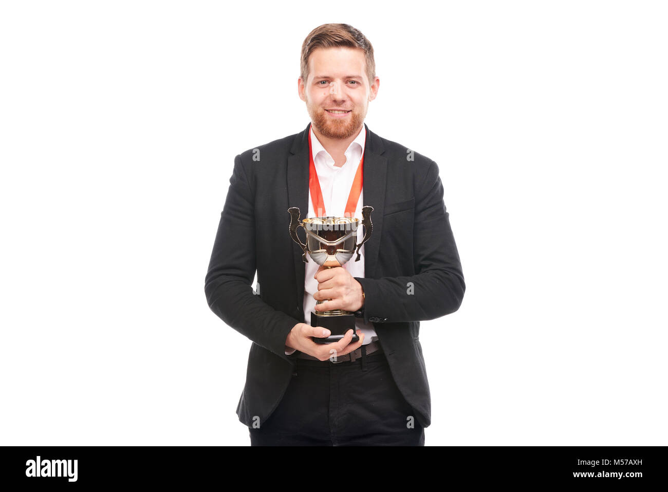 Businessman holding trophy Stock Photo - Alamy