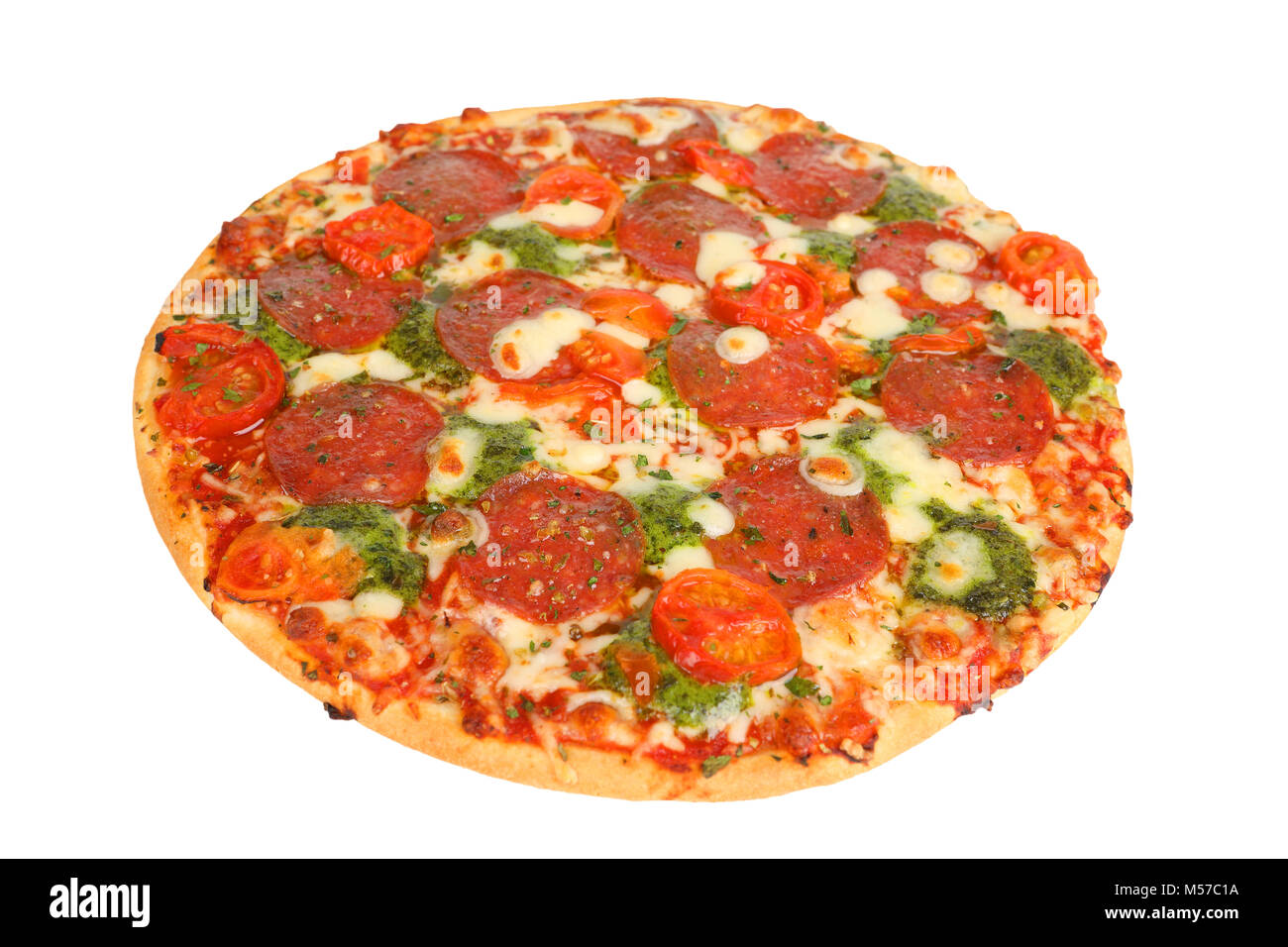 Pizza with pesto and salami Stock Photo