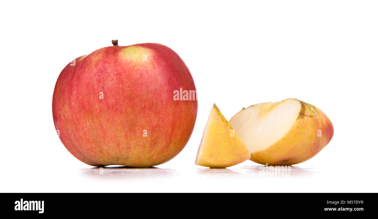 Red yellow apple and slice isolated on white background Stock Photo - Alamy