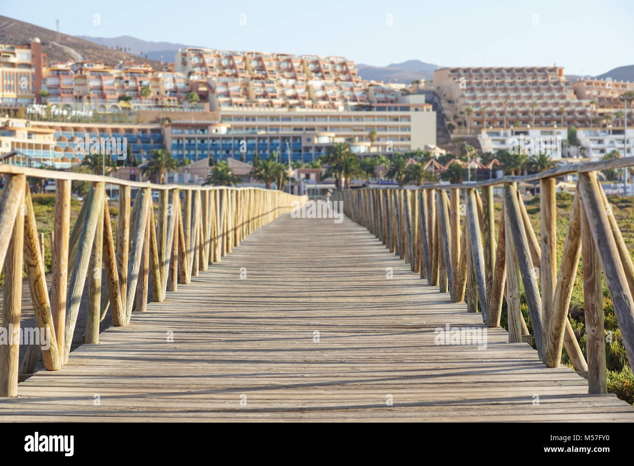 wooden walkway with fences to the Guardamar del segura beach.Alicante,Spain Stock Photo