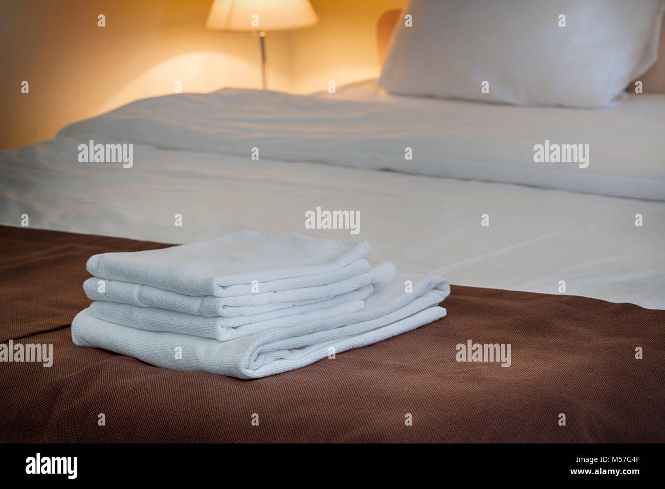 Fluffy white towels on table Stock Photo by ©Sandralise 3390190