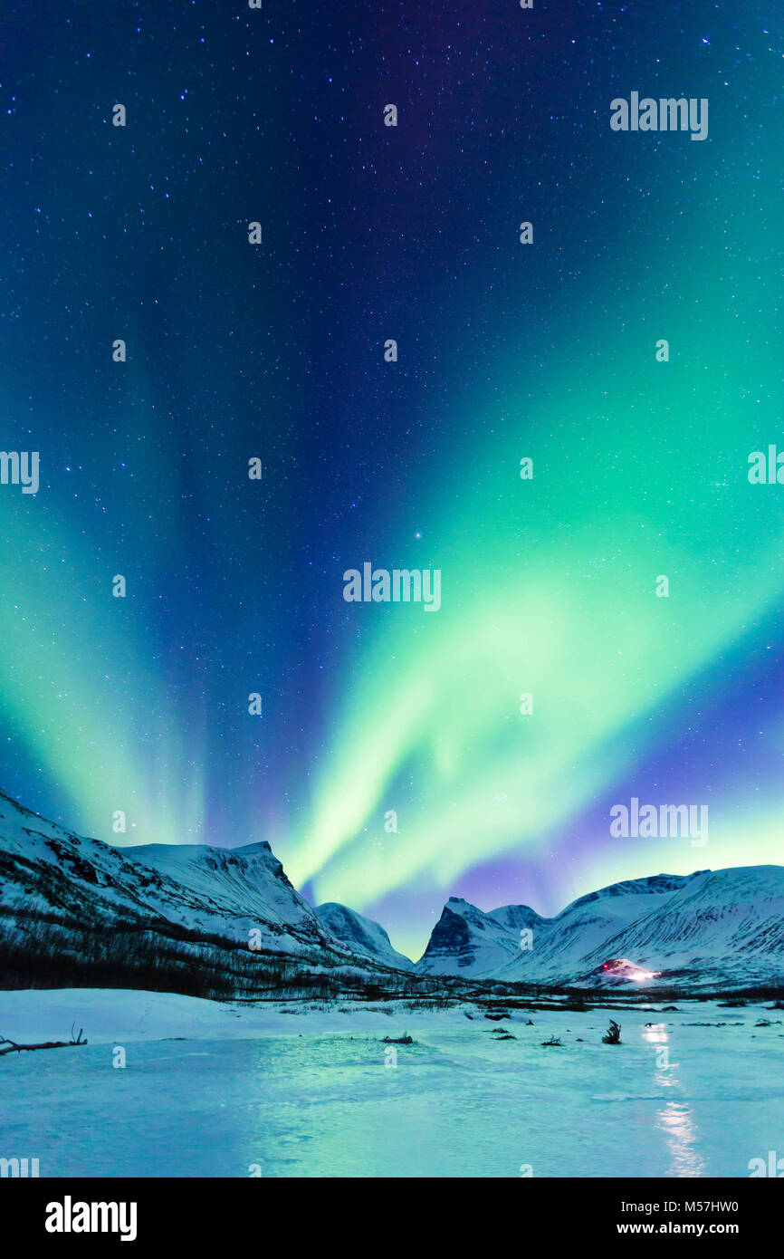 Northern Lights (Aurora borealis) over mountains,Kebnekaise Fjällstation,Kungsleden or king's trail,Province of Lapland Stock Photo