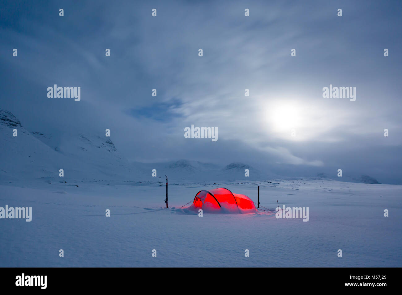Tent by full moon in the snow,Kungsleden or king's trail,Province of Lapland,Sweden,Scandinavia Stock Photo