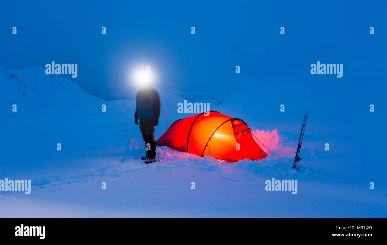 Tent with person in the snow,Kungsleden or king's trail,Province of Lapland,Sweden,Scandinavia Stock Photo