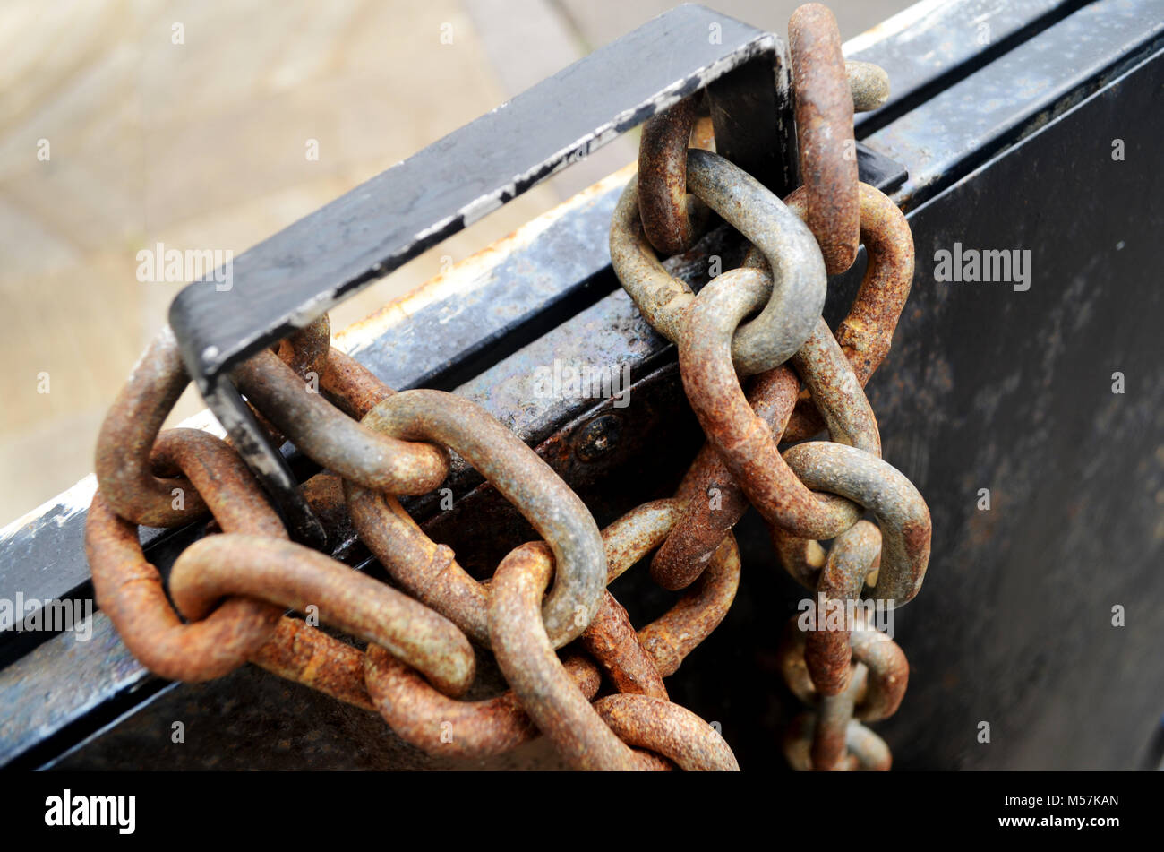 Chained up sign secured by a metal chain Stock Photo - Alamy