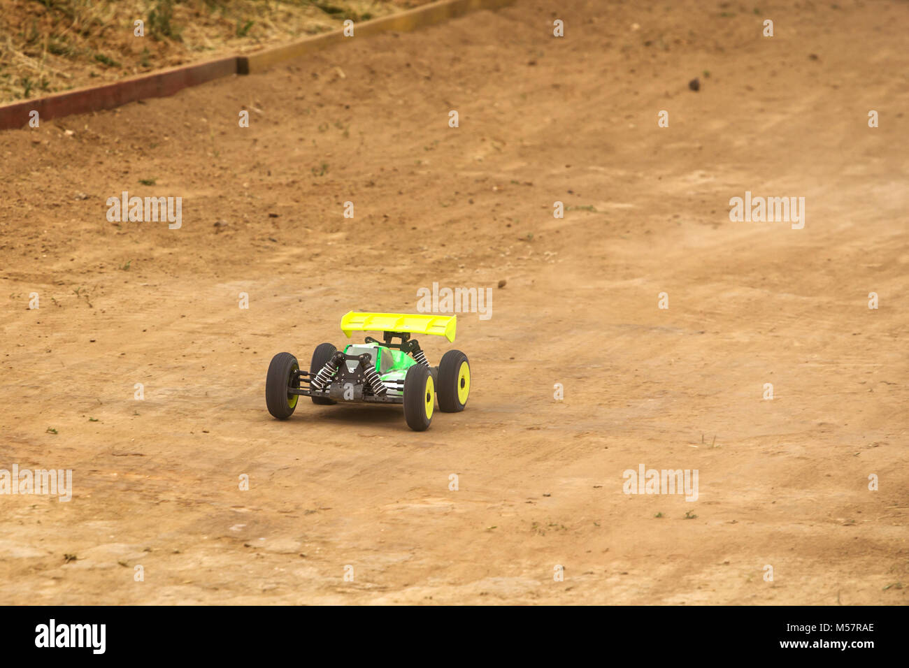 Radio controlled car model in race on dirt track Stock Photo Alamy