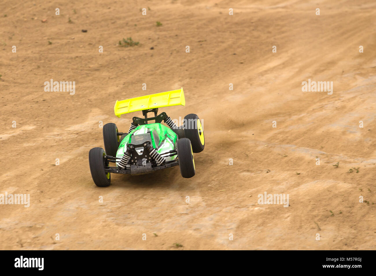 Radio controlled car model in race on dirt track Stock Photo Alamy