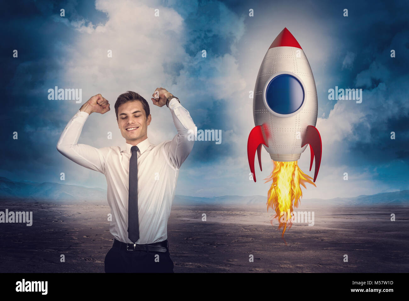 happy businessman and toy concept rocket Stock Photo
