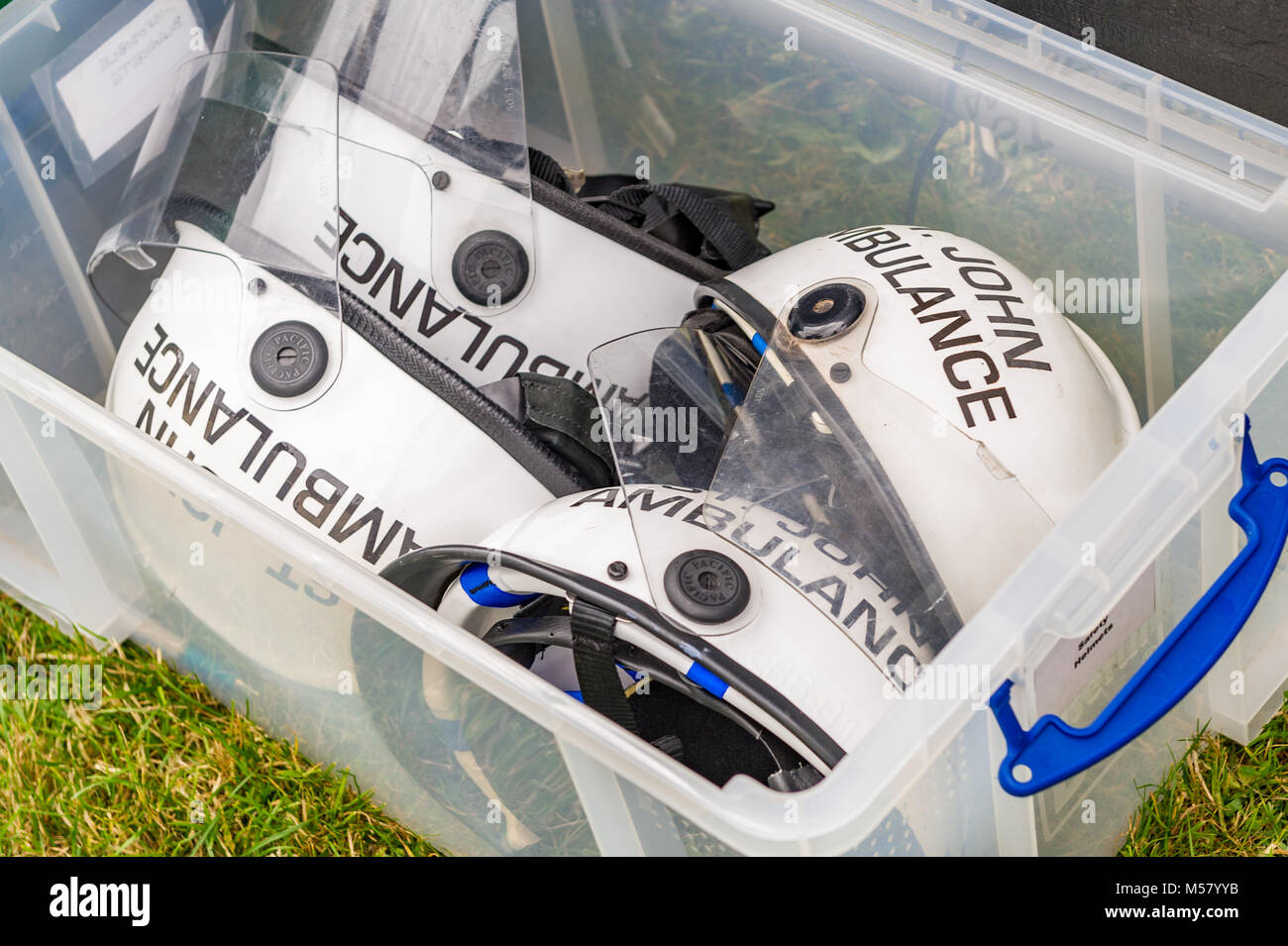 St John Ambulance helmets in a box at a live music festival in Coventry, UK. Stock Photo