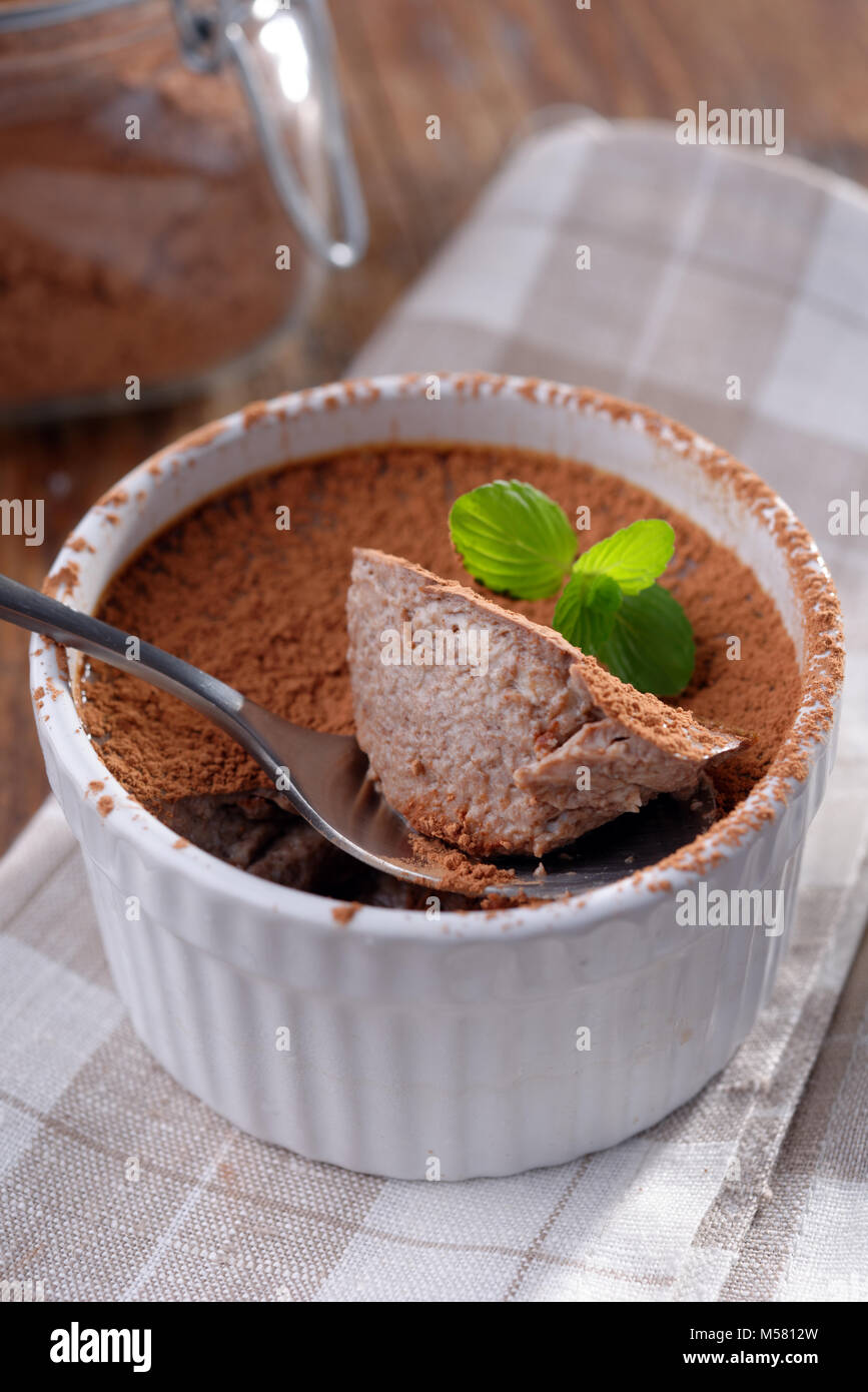 Chocolate flan in a ramekin closeup Stock Photo - Alamy