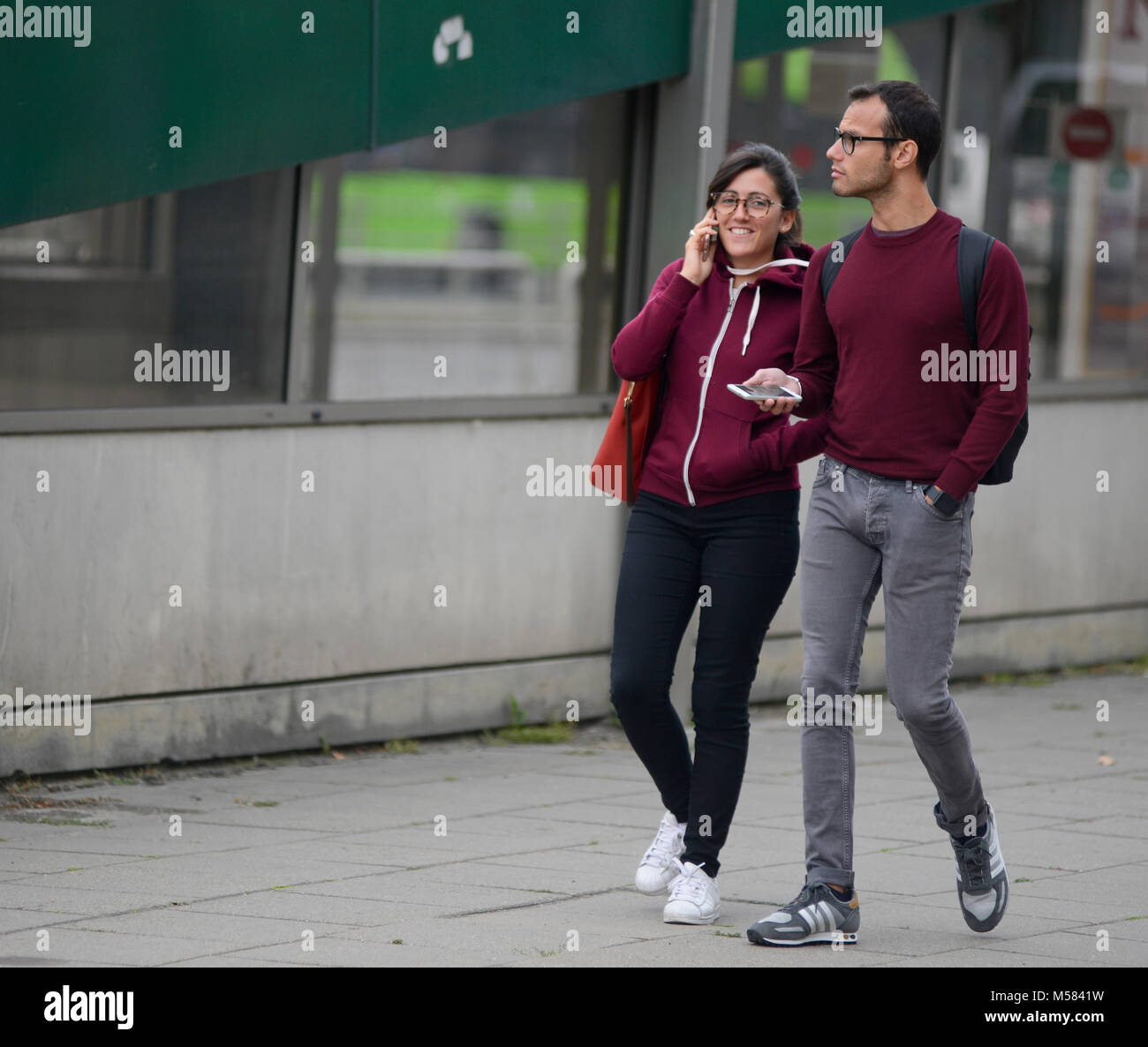 A couple walking down the streets of Kaunas, Lithuania Stock Photo