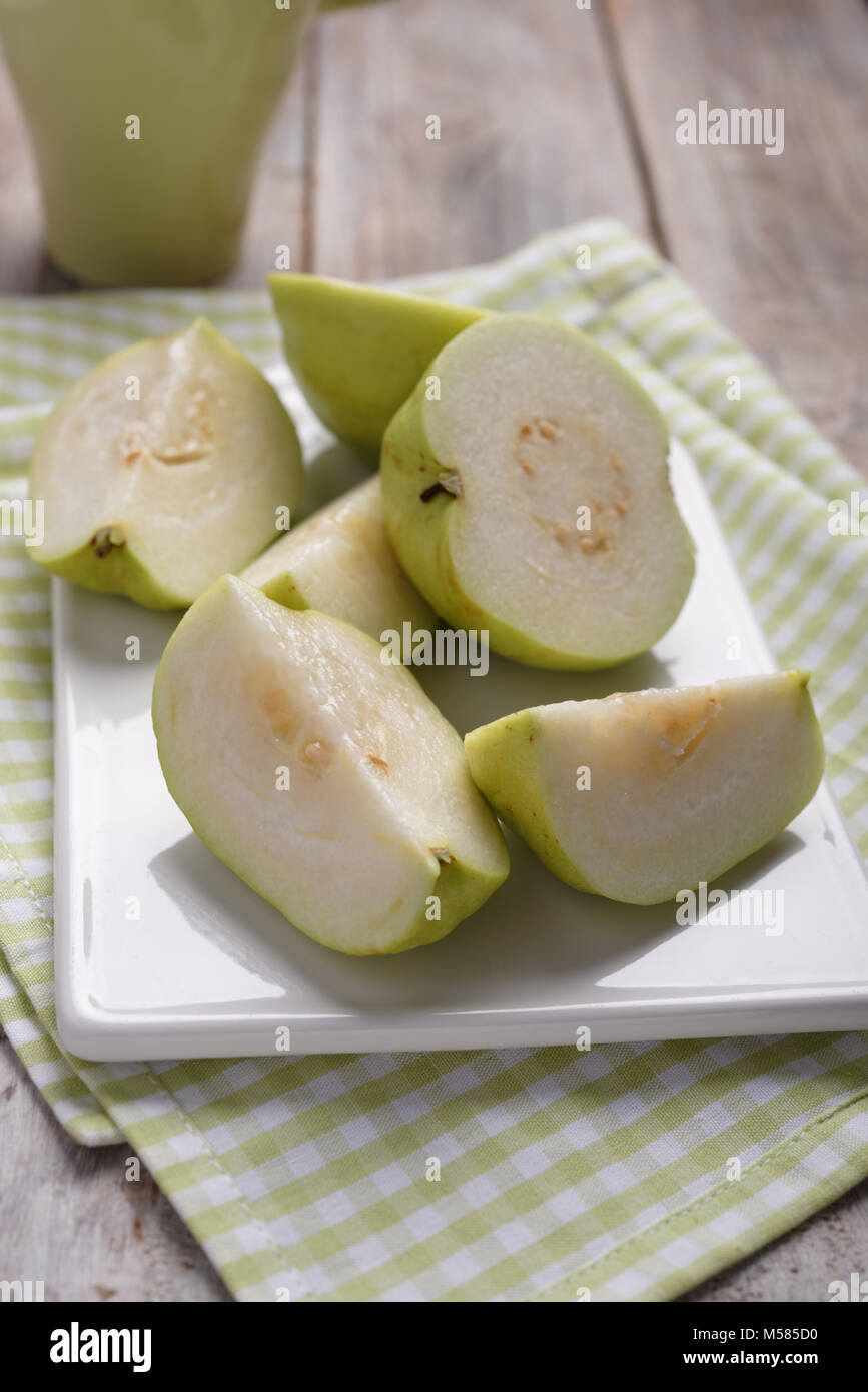 Guava fruits on a rustic table Stock Photo Alamy