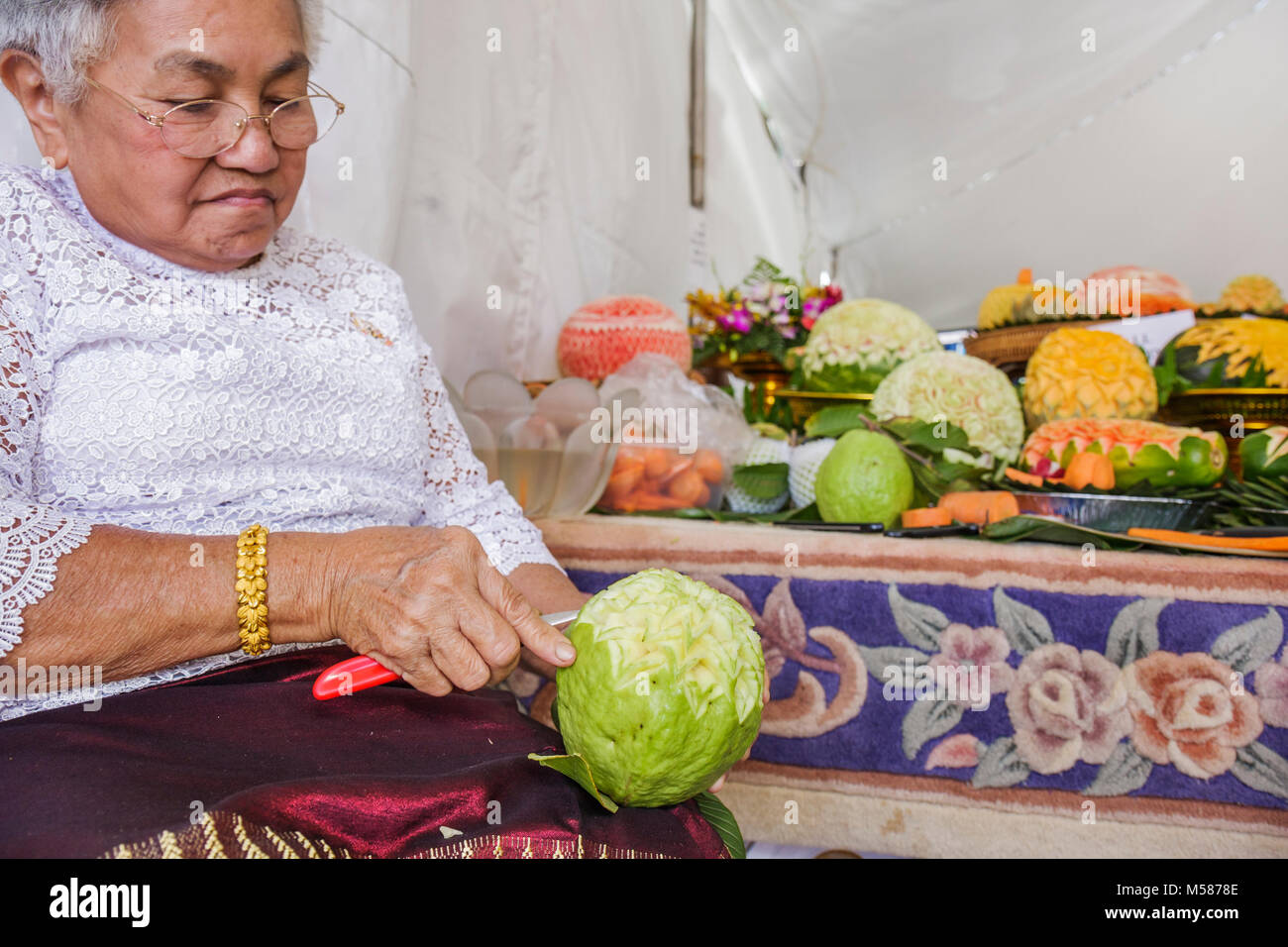 Miami Florida,Homestead,Redlands,Fruit & Spice Park,Asian Culture Festival,festivals fair,Thai,Thailand,carved fruit,vegetable,vegetables,food,senior Stock Photo