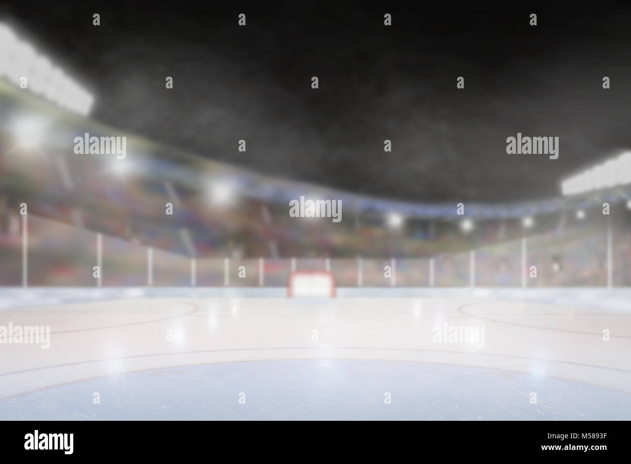 Brightly lit outdoor ice hockey rink arena with focus on foreground and shallow depth of field on background. Deliberate lens flare and copy space. Stock Photo