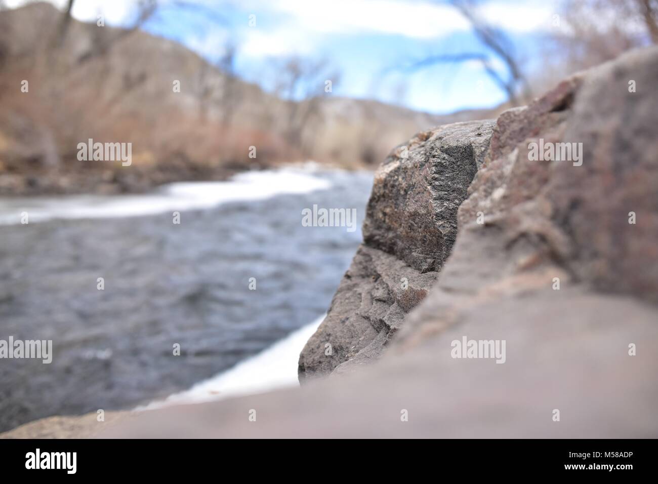 Tranquil rock next to flowing river hi-res stock photography and images ...