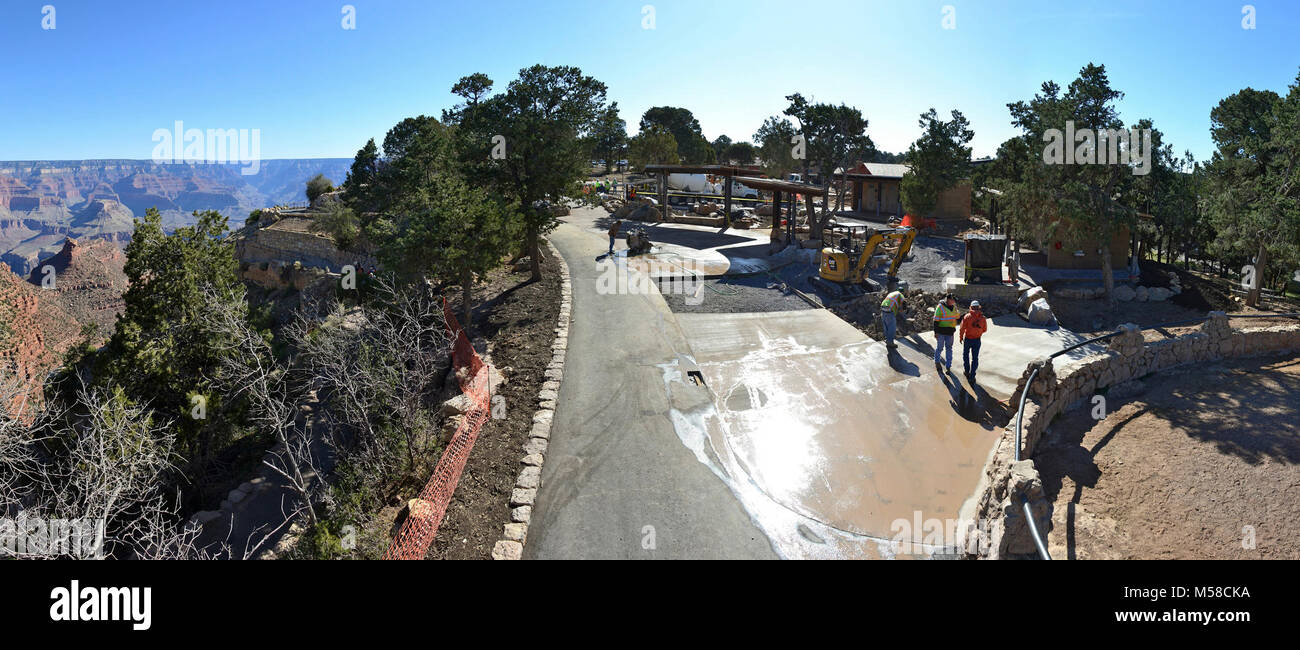 Grand Canyon NP Bright Angel Trailhead Project Paving . April, 24, 2013. With landscape boulders and stonework set in place, workers are now completing the pavement . This includes concrete portions of the trailhead plaza and the remaining footpaths. The overall project is on schedule and should completed by mid May, 2013. NPS Stock Photo